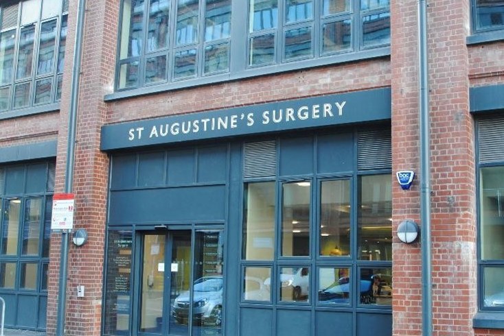 St Augustines Surgery front entrance, red bricks, wide door. 